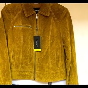 BRAND NEW STILL HAS TAGS!! Women’s medium suede jacket